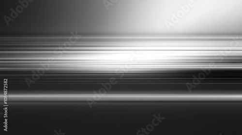 A monochromatic abstract image featuring blurred horizontal lines and light gradients.