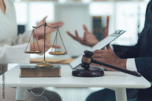 Photos Legal Consultation:  Scales of Justice and Gavel on Table