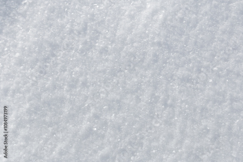 Fine grainy flat fresh white powder snow surface textured background