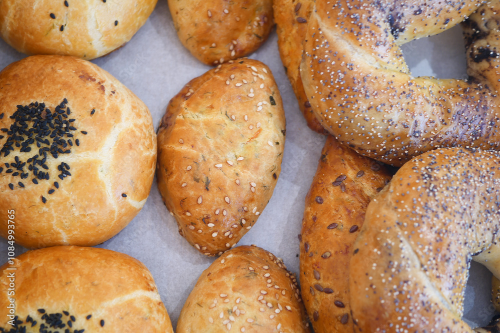 A Variety of Assorted Bakery Breads That Includes Delicious Bagels and Fresh Rolls A Variety of Assorted Bakery Breads That Includes Delicious Bagels and Fresh Rolls