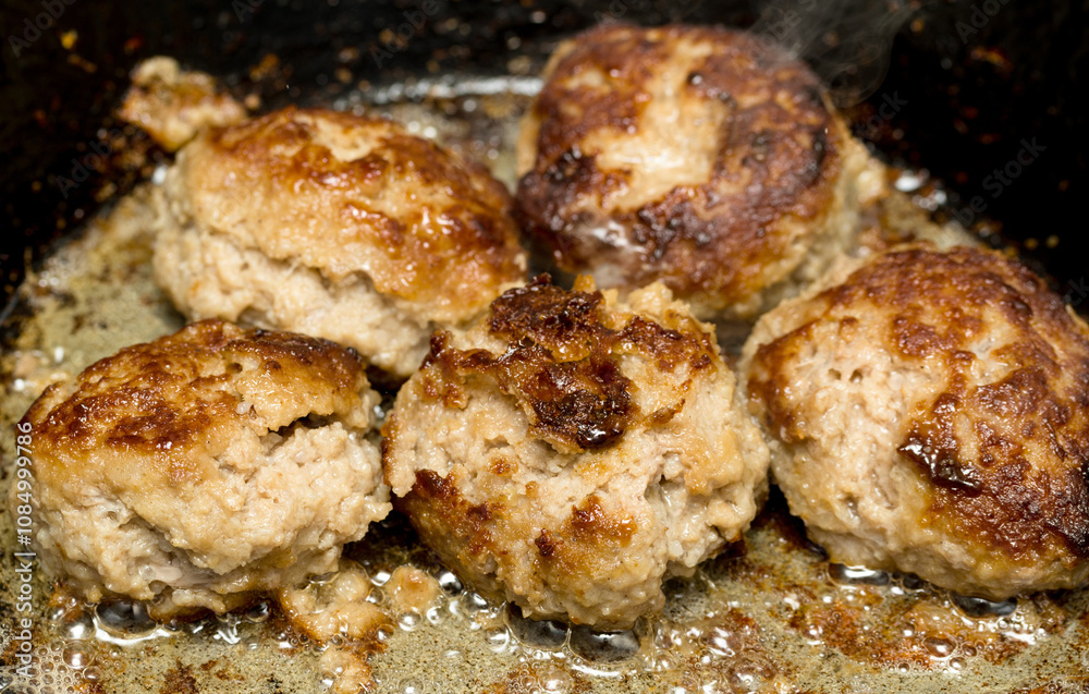 cutlets fried in a pan cutlets fried in a pan