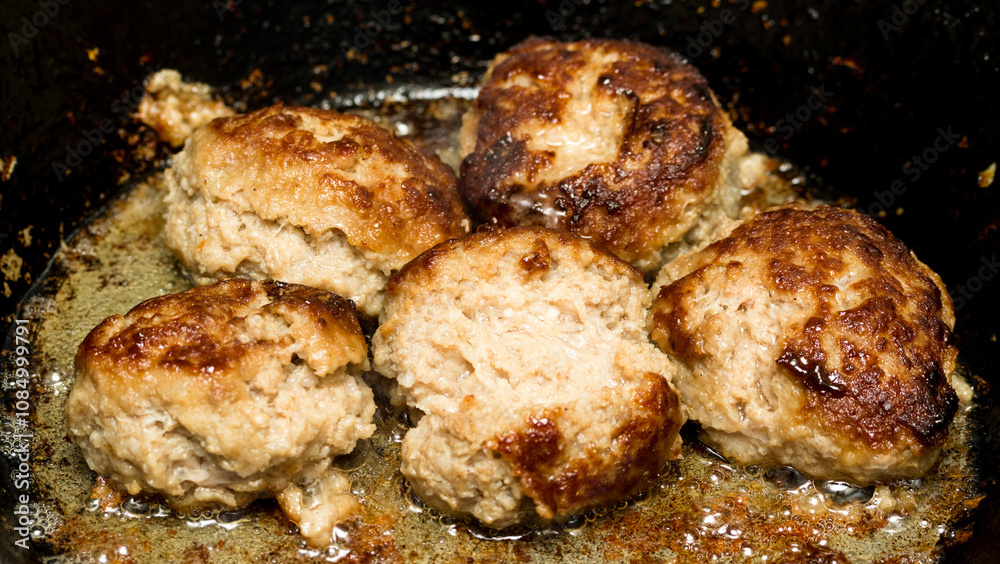 cutlets fried in a pan cutlets fried in a pan