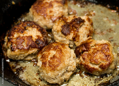 cutlets fried in a pan