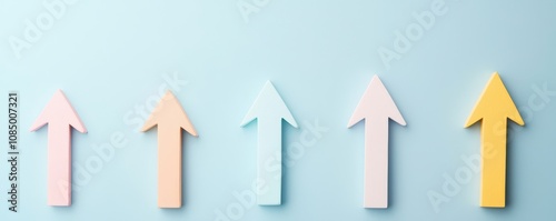 Concept of value chain optimization with forecasting methods. A series of colorful paper arrows pointing upward against a light blue background.