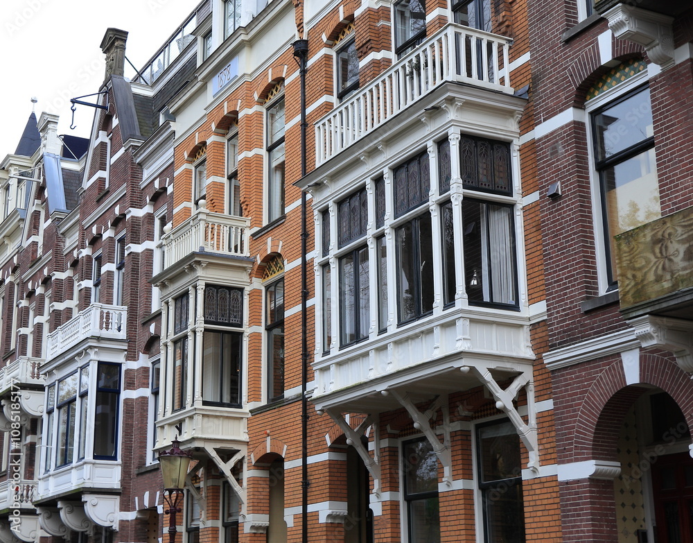 Amsterdam Van Eeghenlaan Brick House Facades with Bay Windows Close Up, Netherlands Amsterdam Van Eeghenlaan Brick House Facades with Bay Windows Close Up, Netherlands