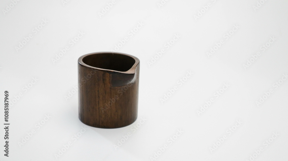 small glass made of teak wood for pouring milk coffee tea or sauce small glass made of teak wood for pouring milk coffee tea or sauce