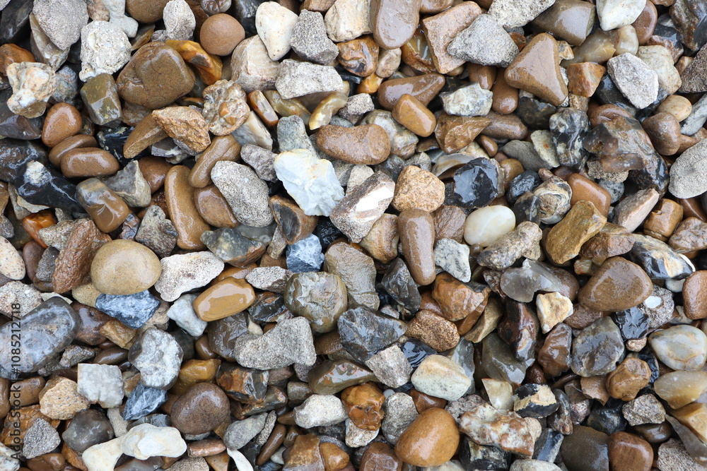 A charming mix of natural pebbles and stones ideal for landscaping and decoration A charming mix of natural pebbles and stones ideal for landscaping and decoration