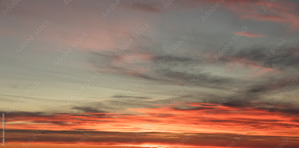 Fototapeta premium Beautiful high up mountains sunset after clear sky in autumn with burnt orange tones