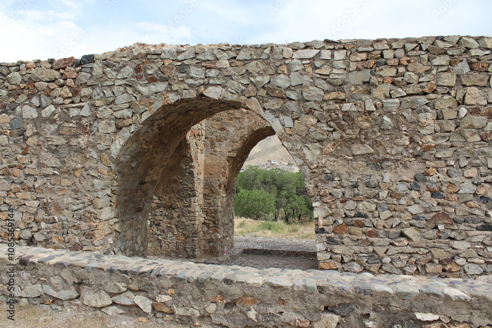 Stone archway in historical ruins, representing the strength and beauty of ancient structures. Stone archway in historical ruins, representing the strength and beauty of ancient structures.
