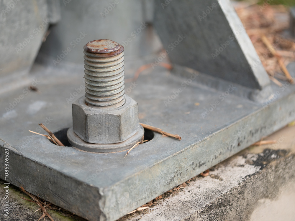 Industrial action close-up of rusty bolt on metal base construction site detailed image urban environment macro perspective Industrial action close-up of rusty bolt on metal base construction site detailed image urban environment macro perspective