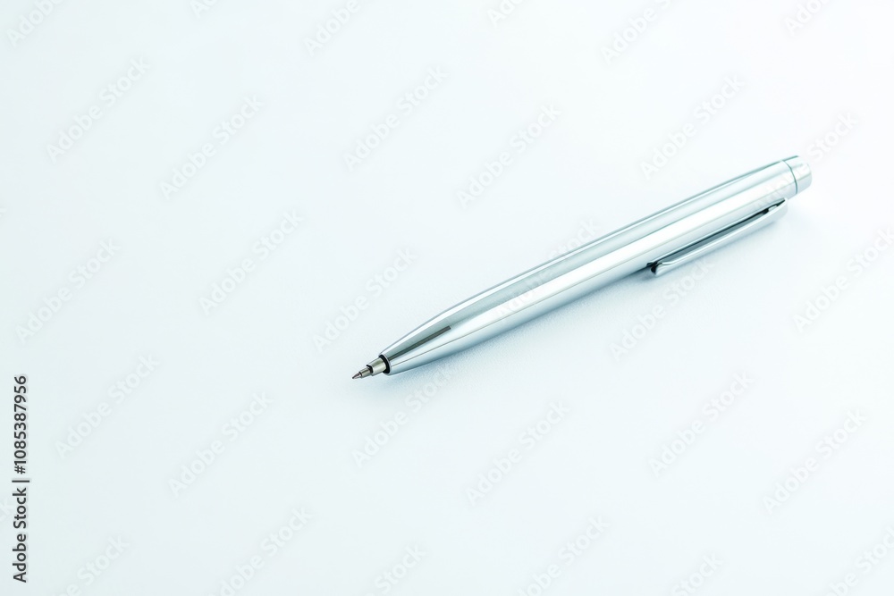 Stylish Black Pen on a White Clean Minimalist Background. Sleek Ballpoint Pen Closeup, Macro. Blank Space for Text. Business office desk design element. Professional Luxury present for writing. Banner Stylish Black Pen on a White Clean Minimalist Background. Sleek Ballpoint Pen Closeup, Macro. Blank Space for Text. Business office desk design element. Professional Luxury present for writing. Banner