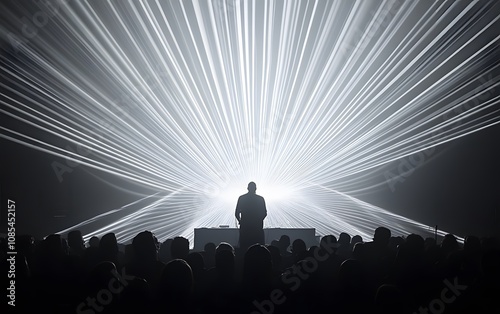 Silhouetted Performer Illuminated By Bright Stage Lights