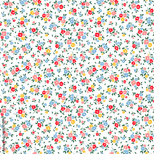 Cute floral background. Floral pattern with small yellow, blue, red and pink flowers on a white background. Seamless pattern for design and fashion prints. Ditsy style. Stock vector illustration.