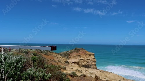 People observing from the viewing deck at the Twelve Apostles