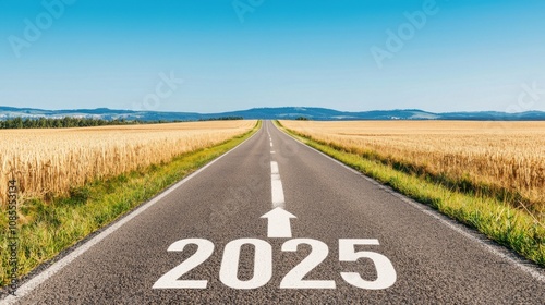 A scenic road stretches through golden fields, marked with "2025," symbolizing a journey toward the future.