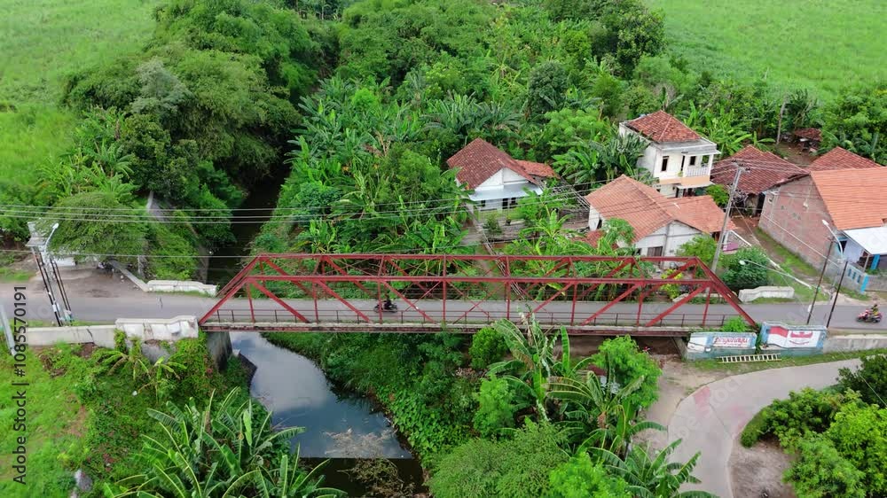 Drone view of village with steel bridge Drone view of village with steel bridge