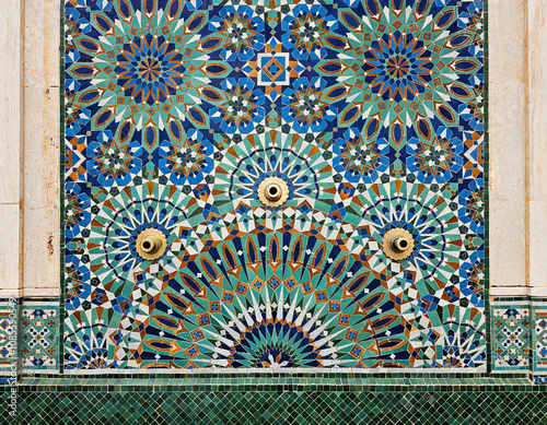 beautiful Moroccan Colorful zellige tiles pattern - Mosaic pattern, traditional Islamic Moroccan geometric design in the Exterior of Hassan II Mosque w