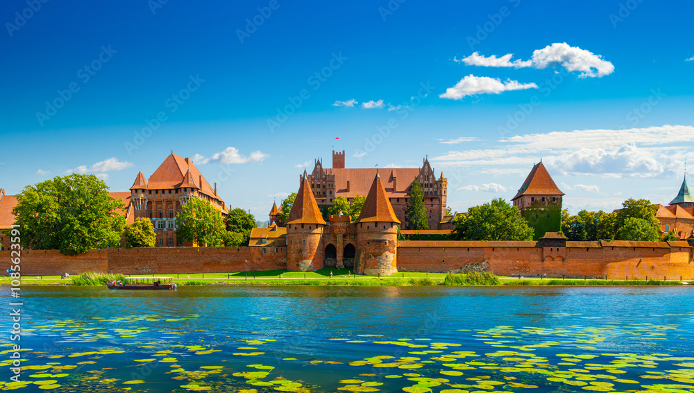 The Castle of the Teutonic Order in Malbork by the Nogat river. Poland