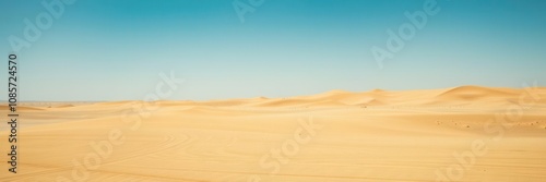 A vast and arid desert landscape under a clear blue sky, arid, extreme conditions, sand dunes