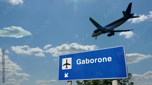 Plane landing in Gaborone Botswana airport with signboard