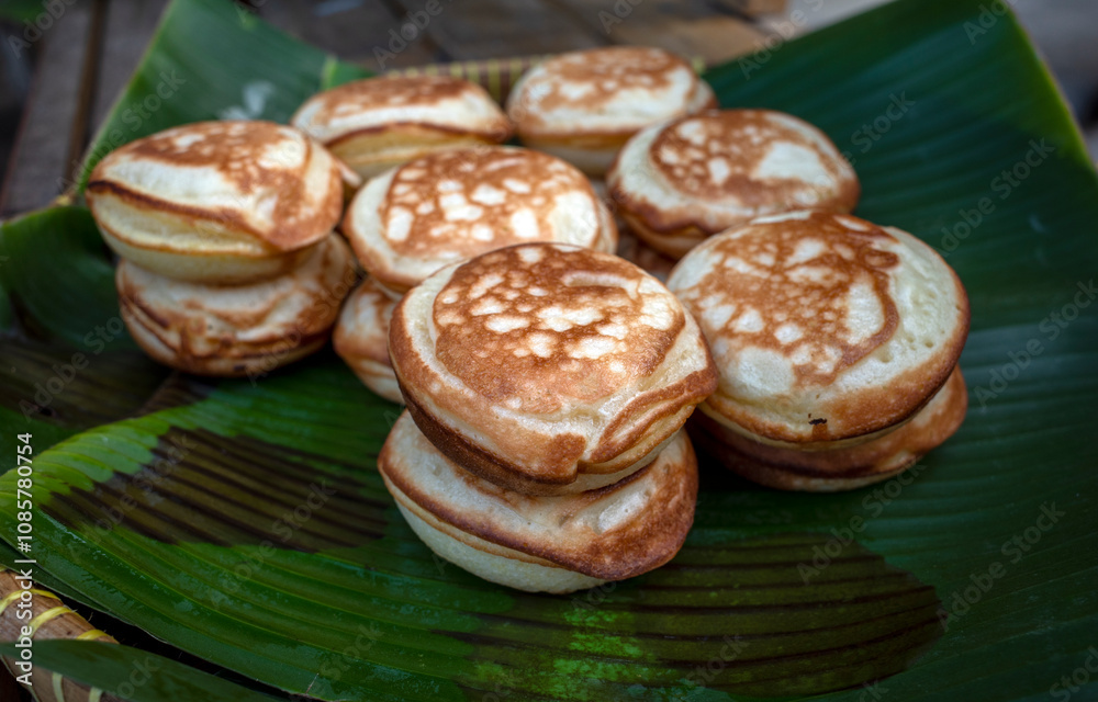 Kue Apem, an Indonesian traditional cake on street food market, in Yogyakarta, Indonesia Kue Apem, an Indonesian traditional cake on street food market, in Yogyakarta, Indonesia