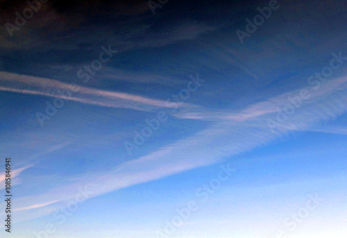Blue Skys With Aeroplan condensation trails Contails in White Smoke for Background
