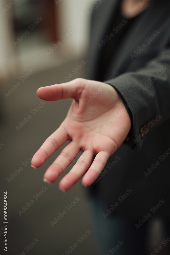 hand gesture openness inviting presenting item often used social situations hand gesture openness inviting presenting item often used social situations