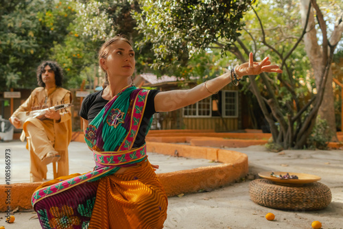 Indian musician in traditional clothes playing sitar festive season outdoor home. Smiling young woman in traditional saree dancing and enjoy festival. Happy Diwali greeting photo. Part of a series