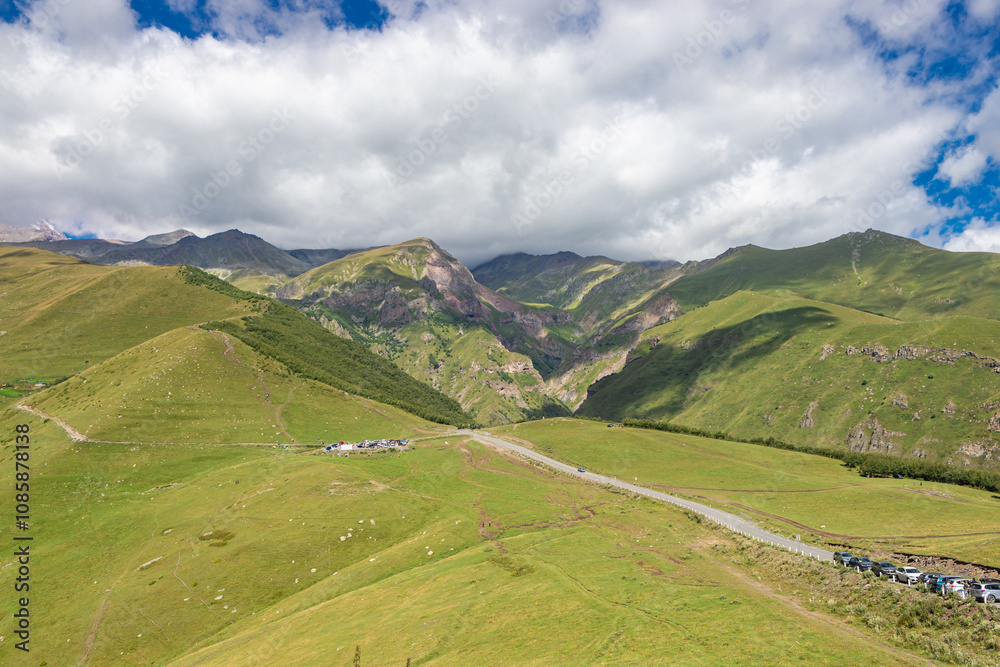Caucasian mountains near Gergeti village, Stepansminda. Kazbegi mountain behind the clouds. Georgia
