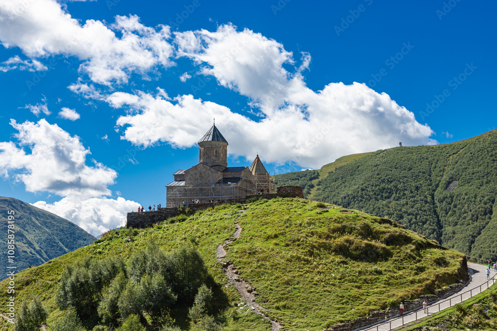 GERGETI, GEORGIA - AUGUST 13, 2024: Gergeti Trinity Church (Tsminda Sameba), Holy Trinity Church near the village of Gergeti, under Mount Kazbegi