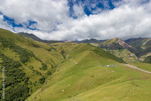 Obraz na płótnie Caucasian mountains near Gergeti village, Stepansminda. Kazbegi mountain behind the clouds. Georgia w salonie