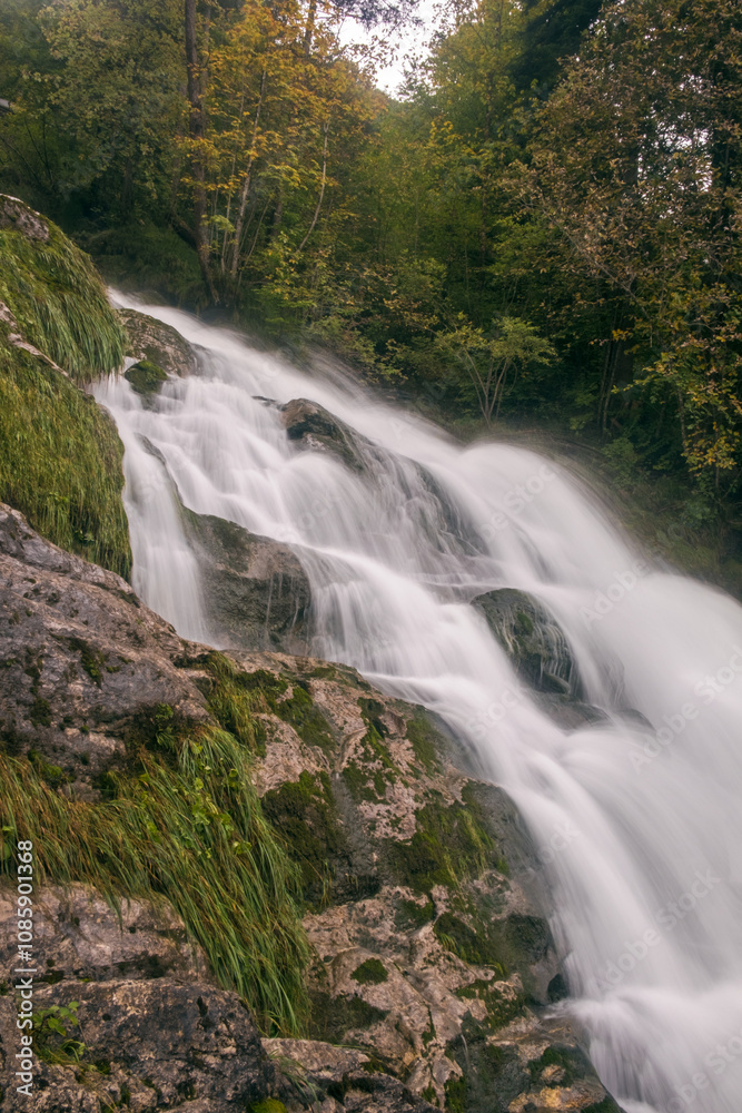 Fototapeta premium Long exposure of a cascade of the Giessbach Falls, Brienz, Switzerland