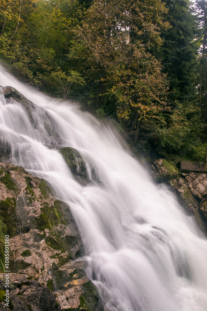 Obraz premium Side view of the lower part of the Giessbach Falls in Switzerland