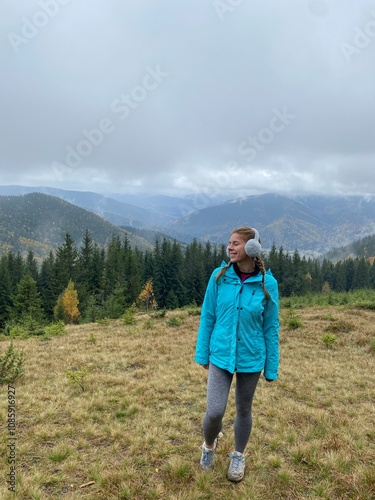 person walking in the mountains