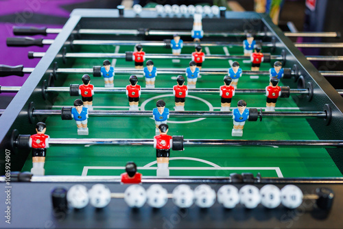 Table football in a modern game room in close-up.