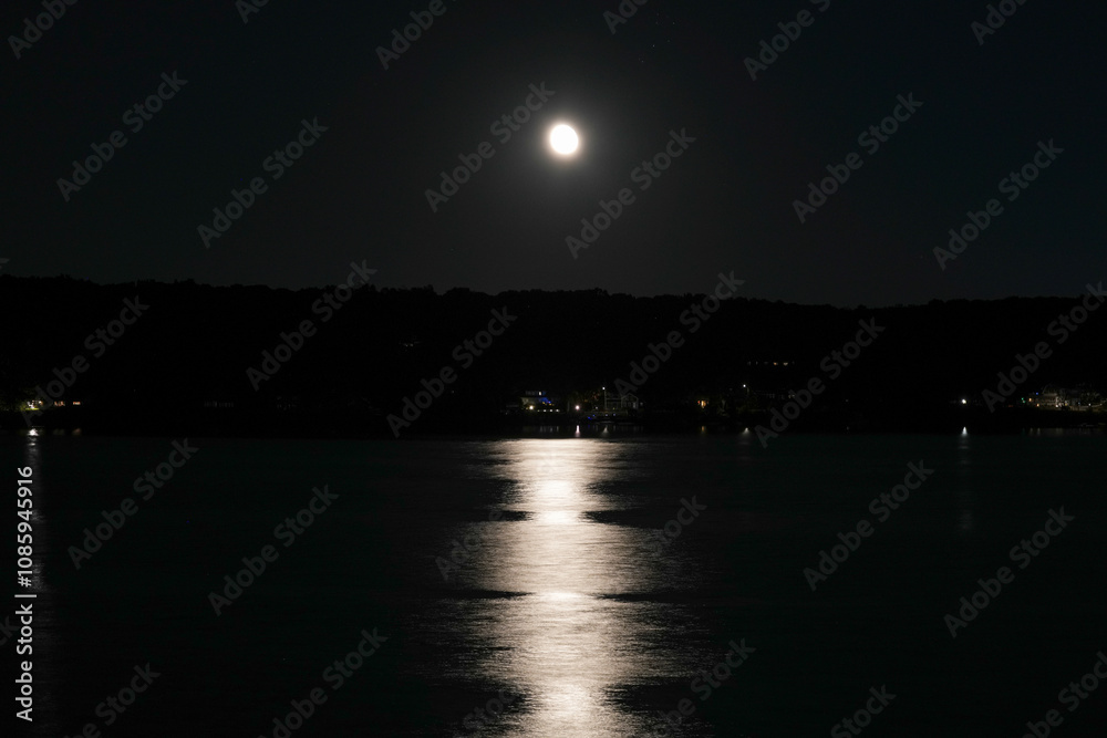 Fototapeta premium Moon Reflected Across the Niantic River at Night
