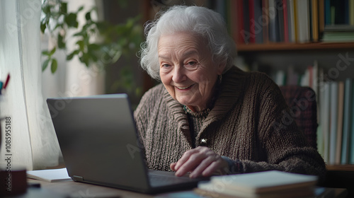 Elderly woman attending an online lesson on a laptop in a cozy home setting