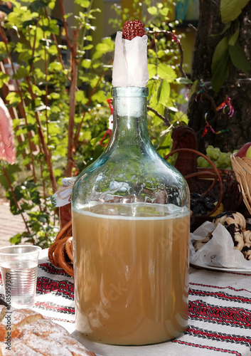 Antique bottle of juice on the table