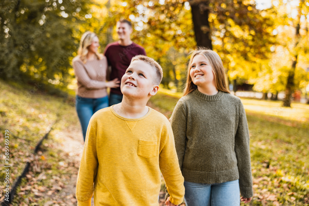 Family Enjoying Walk In Park Family Enjoying Walk In Park