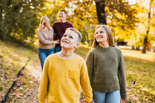 Family Enjoying Walk In Park