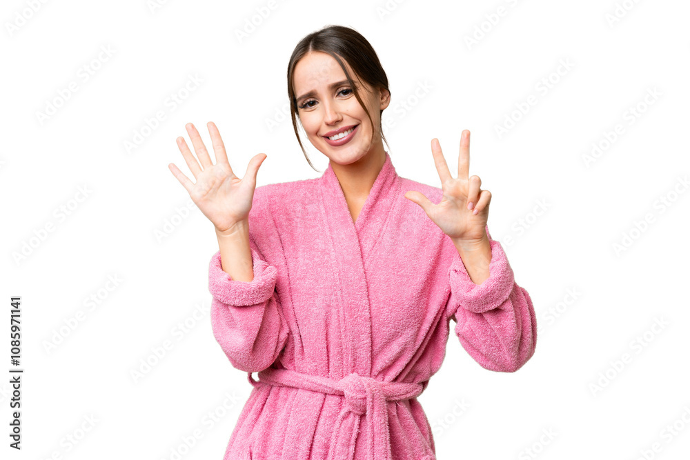 Young beautiful woman in a bathrobe over isolated chroma key background counting eight with fingers Young beautiful woman in a bathrobe over isolated chroma key background counting eight with fingers