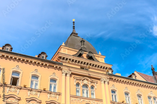 A panoramic city view of Novi Sad with its iconic bridge over the Danube River is a breathtaking sight. From this vantage point, the city sprawls beneath the sky, with the elegant Varadin Bridge