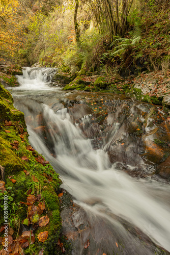 Infierno River waterfalls in autumn, on the Pexanca route, Infiesto, Asturias, Spain photo