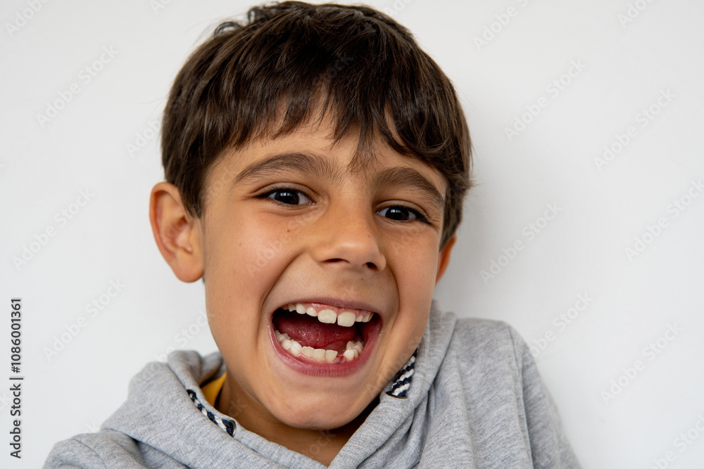 Joyful child celebrating first lost tooth and waiting for the Tooth Fairy Joyful child celebrating first lost tooth and waiting for the Tooth Fairy