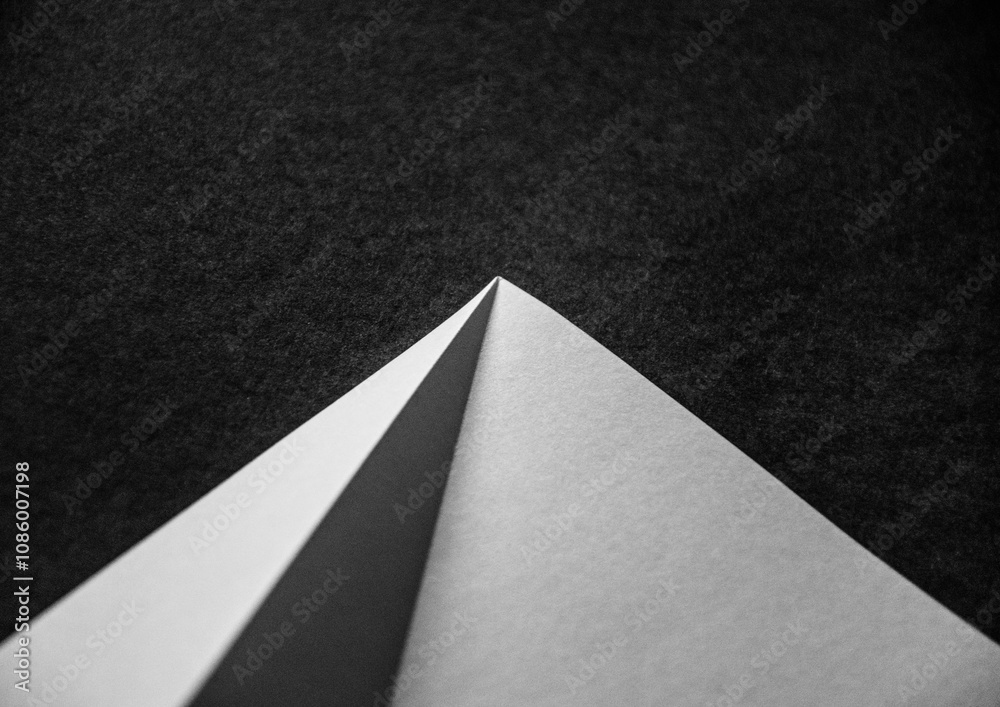 Black and white photos of paper texture with light and shadows Black and white photos of paper texture with light and shadows