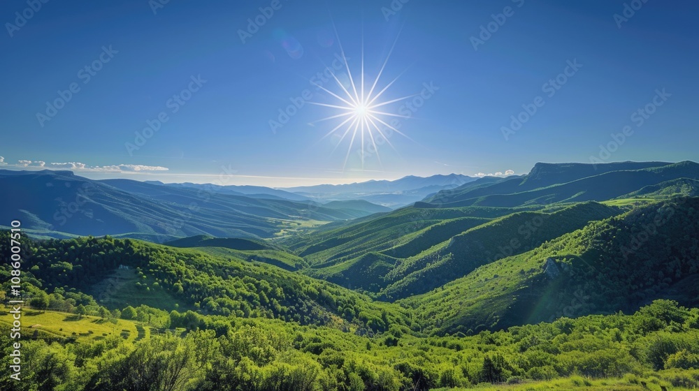 Obraz premium A sunny day with bright sunlight on rolling green hills