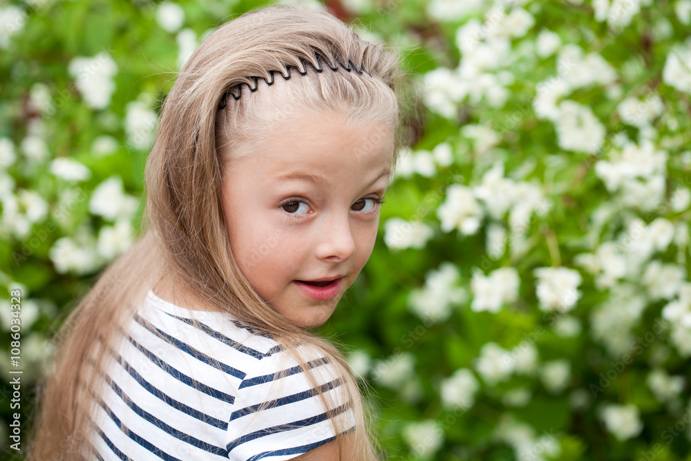 Close up portrait of a seven year little girl, against background of summer park Close up portrait of a seven year little girl, against background of summer park