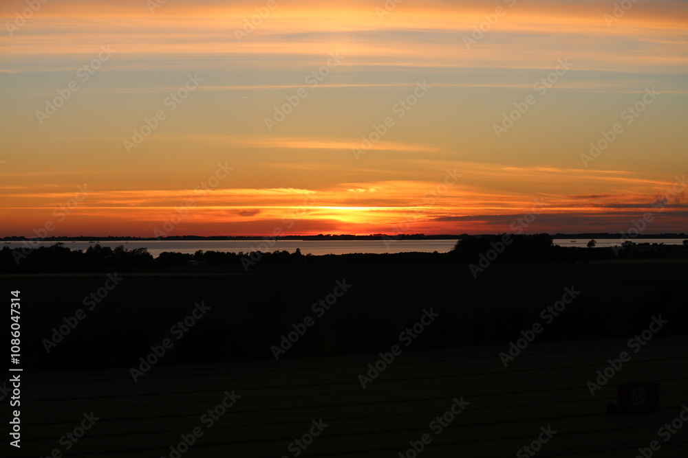 Fototapeta premium sunset over the river