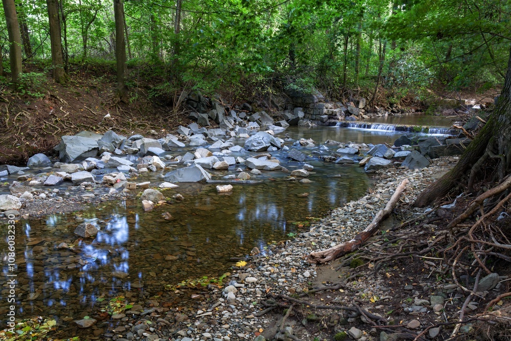 Stones under a broken weir after a flood. Juhyne. Czechia.