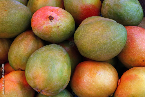 Fresh mango fruits on market stall